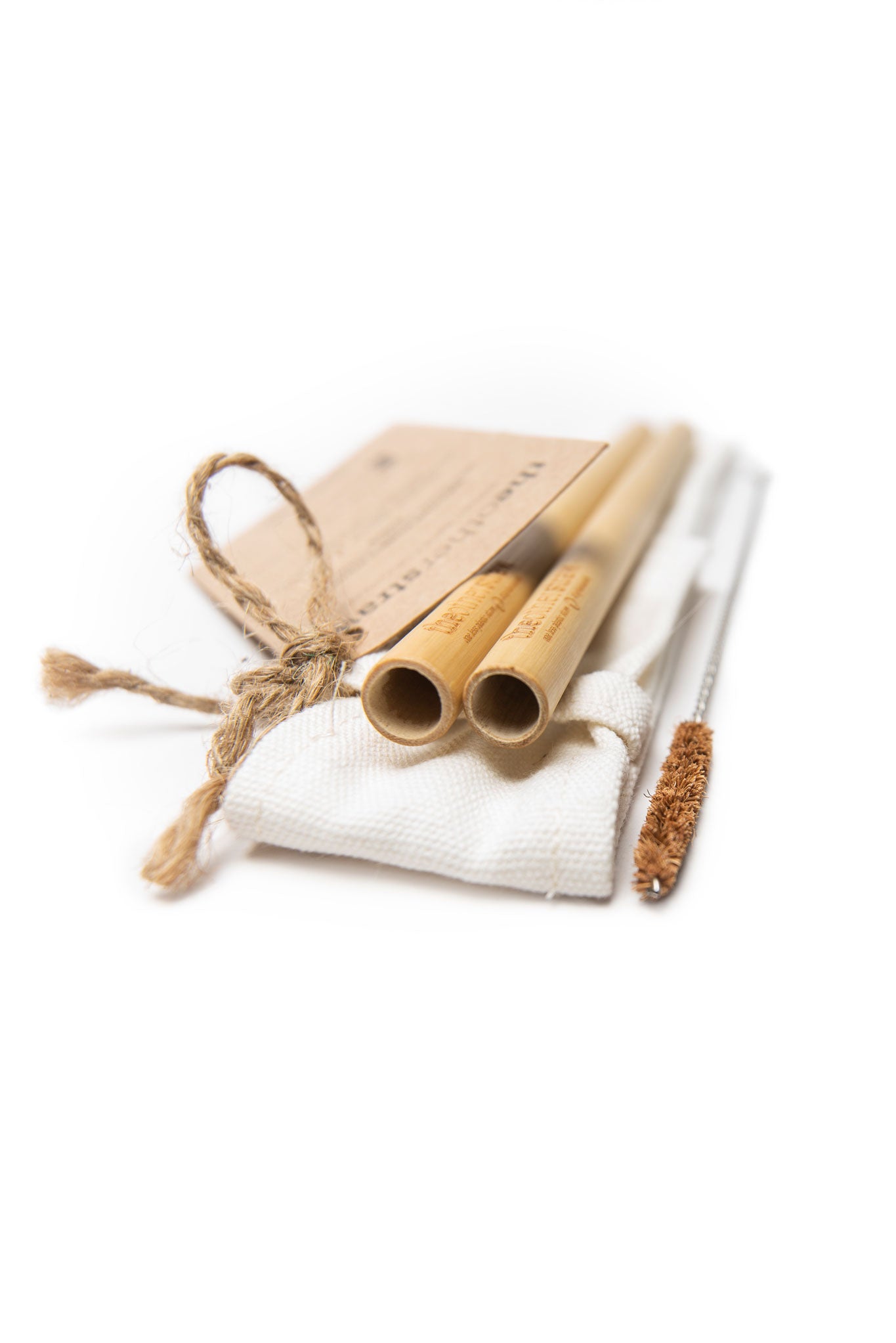 2 smoothie bamboo straws on cotton pouch with coconut fibre cleaning brush
