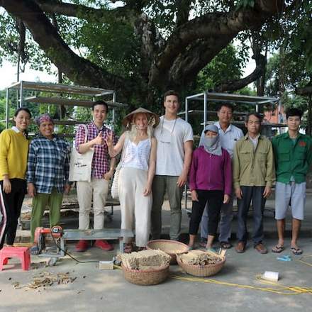 photo of Jamie and Len, the co founders of theotherstraw with reusable bamboo straws in their hands
